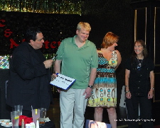 Hank Morfin Performs On Stage With Some Help From Audience Members